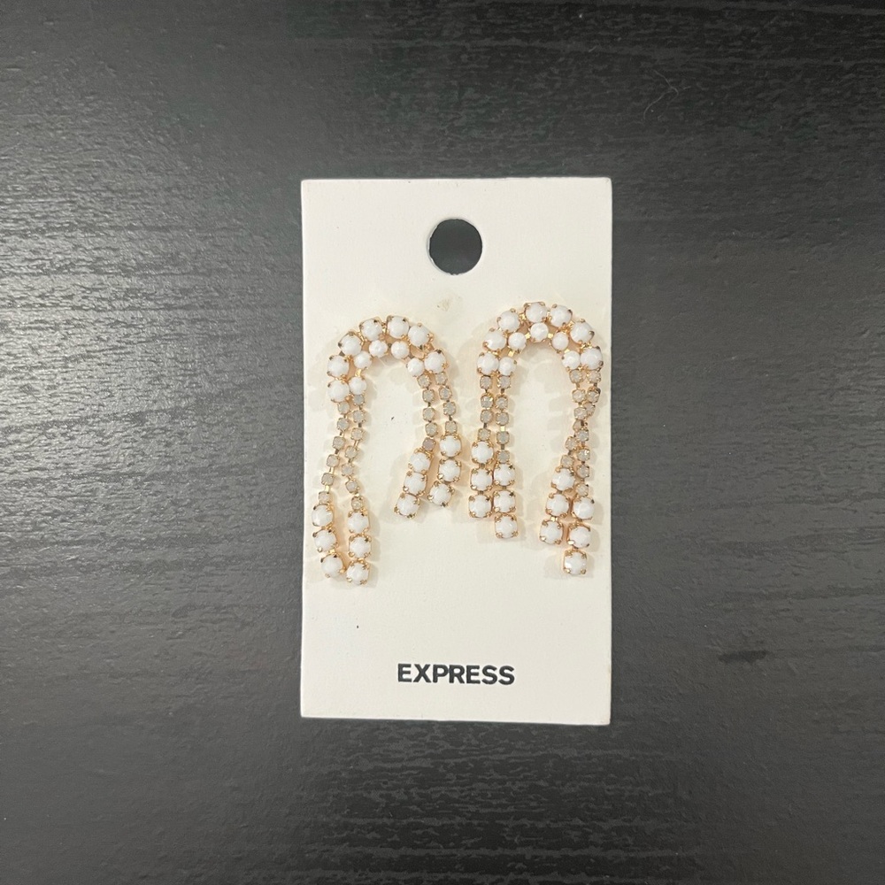 Express earrings. White gemstones. New.